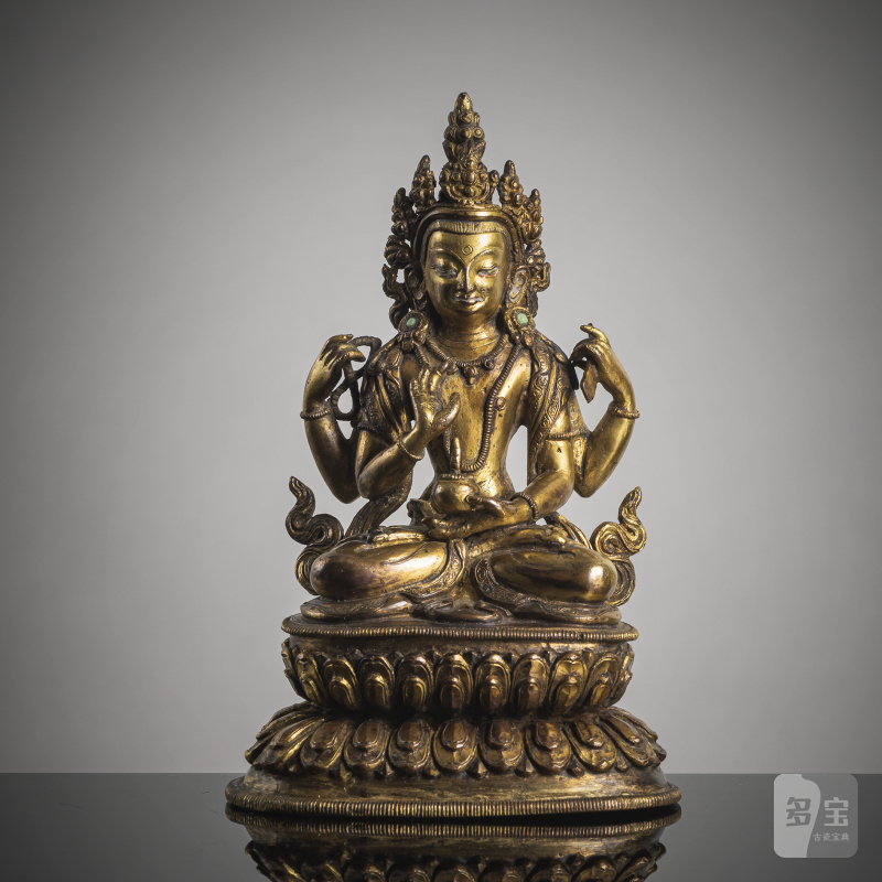 A GILT-COPPER FIGURE OF MANJUGOSHA